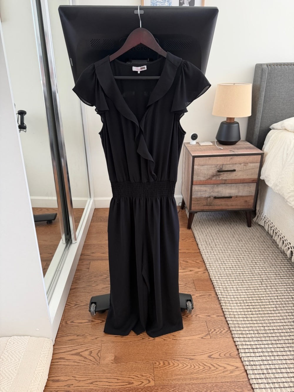 Parker Black Women's Ruffle V-Neck Jumpsuit with Smocked Waist